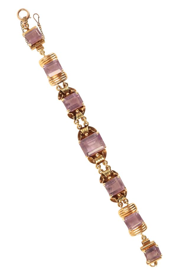 AN 18CT GOLD AND AMETHYST BRACELET