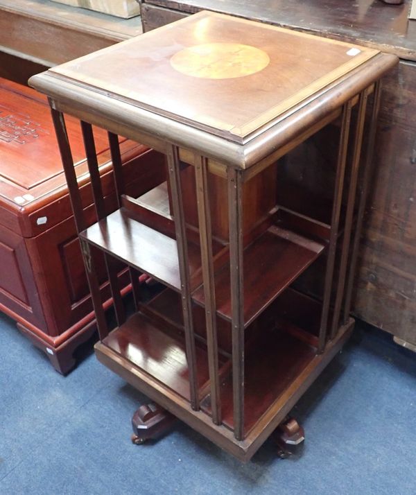 A EDWARDIAN MAHOGANY REVOLVING BOOKCASE