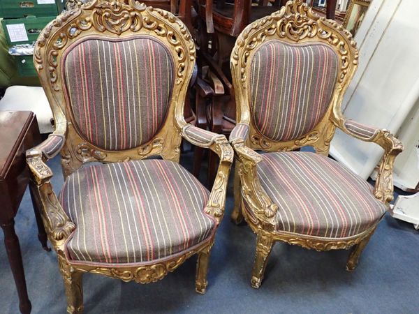 A PAIR OF LOUIS XV STYLE GILTWOOD ARMCHAIRS