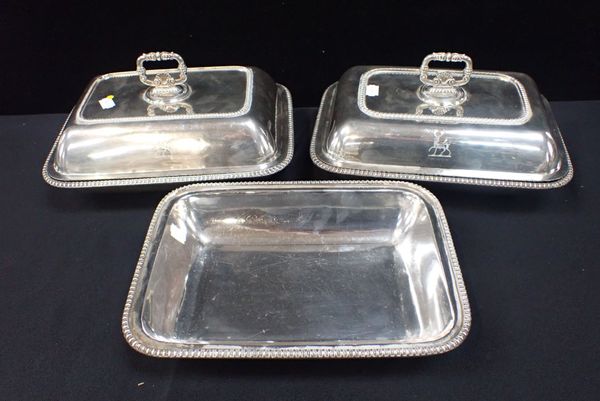 A PAIR OF SILVER PLATED COVERED SERVING DISHES