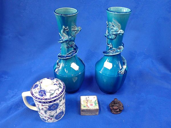 A PAIR OF TURQUOISE GLAZED VASES ENTWINED WITH DRAGONS