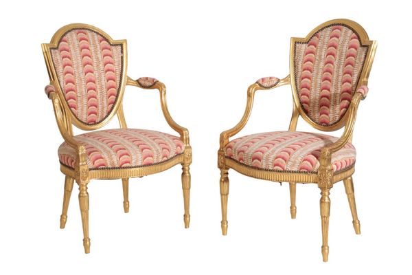 A SET OF FOUR CARVED AND GILTWOOD FAUTEUILS, IN LOUIS XV STYLE,