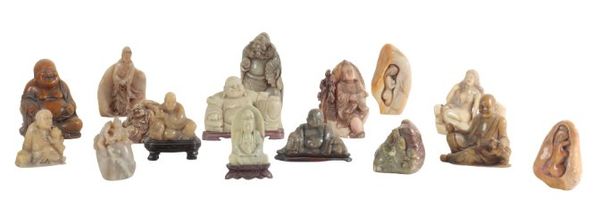 A COLLECTION OF SIXTEEN CHINESE CARVED FIGURES
