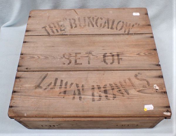 A VINTAGE PINE-CASE LAWN BOWLING SET ; THE 'BUNGALOW'