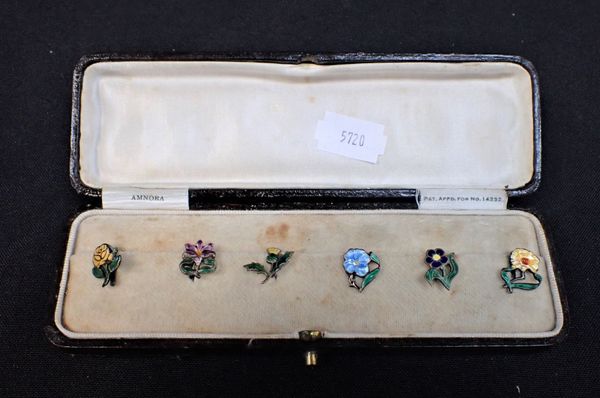 A BOXED SET OF DRESS CLIPS