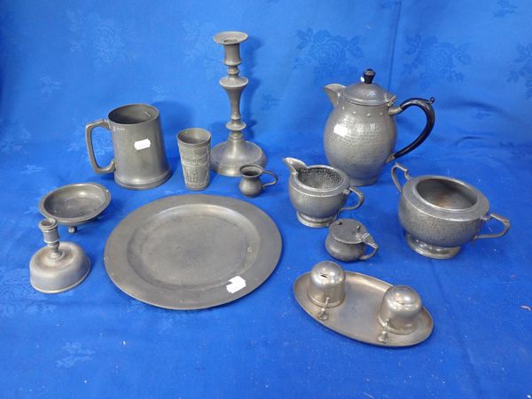 A HAMMERED PEWTER TEA SET