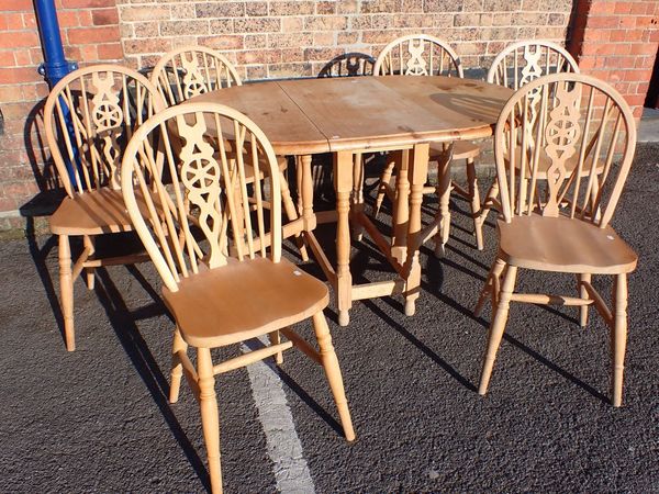 A SET OF SIX BEECHWOOD WINDSOR WHEELBACK CHAIRS