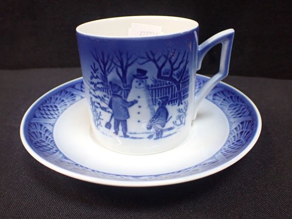 A ROYAL COPENHAGEN CHRISTMAS CUP AND SAUCER