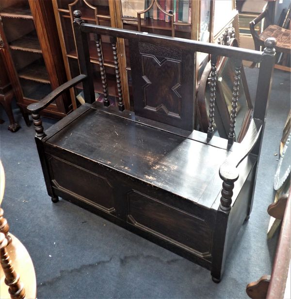 A 1920S OAK HALL BENCH