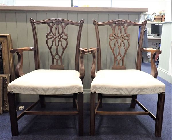 A PAIR OF REPRODUCTION MAHOGANY ARMCHAIRS OF CHIPPENDALE DESIGN