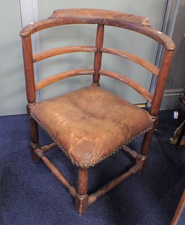 AN 18TH CENTURY WALNUT CORNER CHAIR