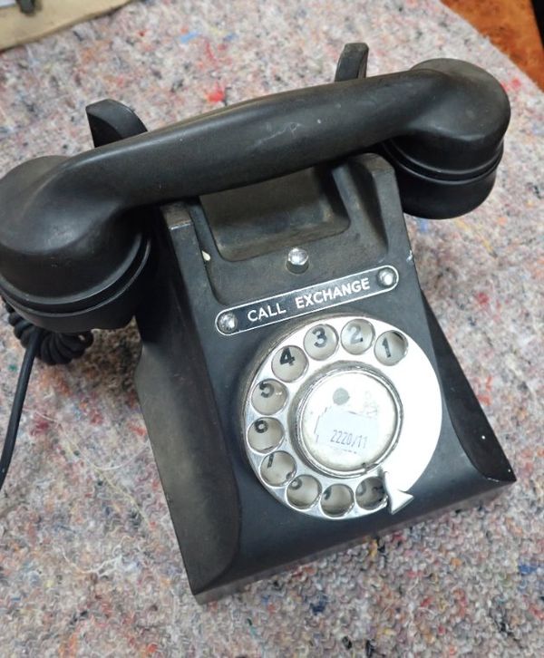 A VINTAGE BLACK BAKELITE TELEPHONE