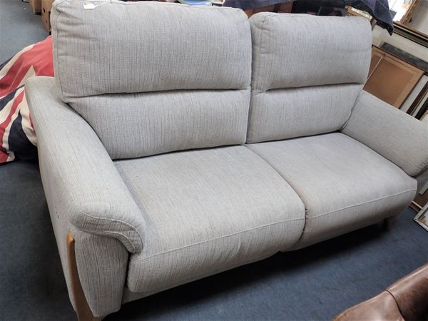 A MODERN TWO-SEATER SOFA, WITH ELECTRIC RECLINING ACTION