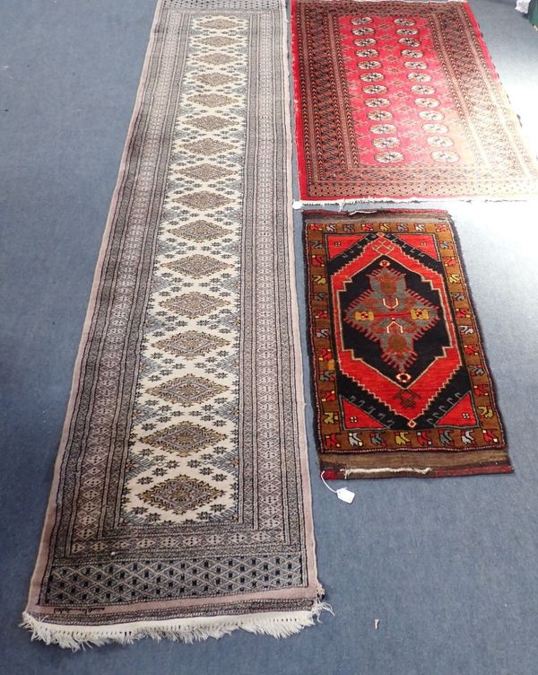 A SMALL TURKOMAN STYLE RUG