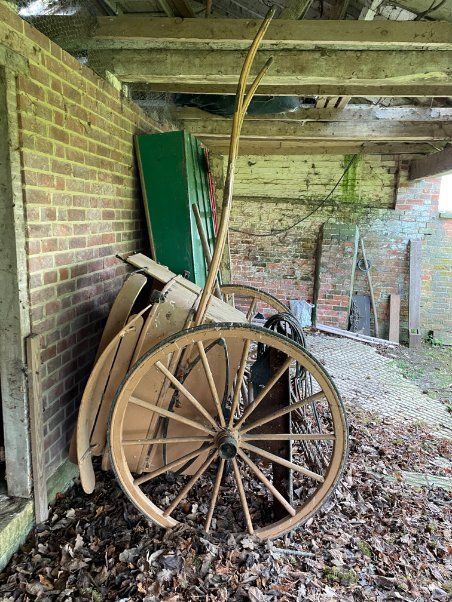 A VICTORIAN PAINTED WOOD AND METAL DOG CART,