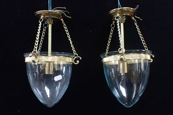 A PAIR OF SMALL REGENCY STYLE BRASS AND GLASS HALL LANTERNS