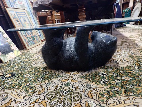 A CONTEMPORARY COFFEE TABLE, IN THE FORM OF A BEAR