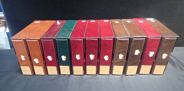 A QUANTITY OF ALBERT'S BROWN VINYL CIGARETTE CARD ALBUMS