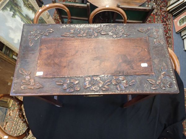 A MAHOGANY SIDE TABLE WITH CARVED TOP