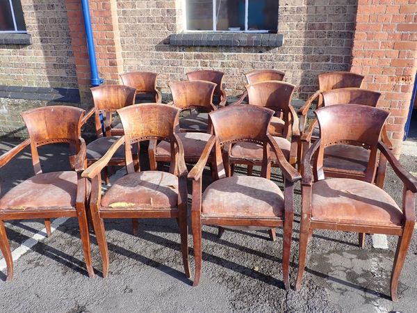 A SET OF TWELVE EARLY 20TH CENTURY CONTINENTAL STAINED DINING CHAIRS