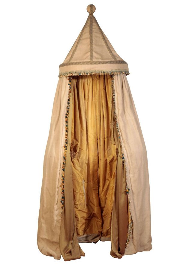 A COTTON AND SILK DRAPED CHANGING TENT