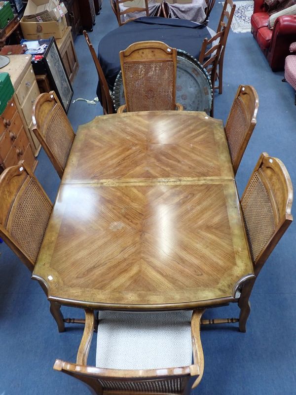 A FRENCH STYLE DINING  TABLE AND SIX CHAIRS