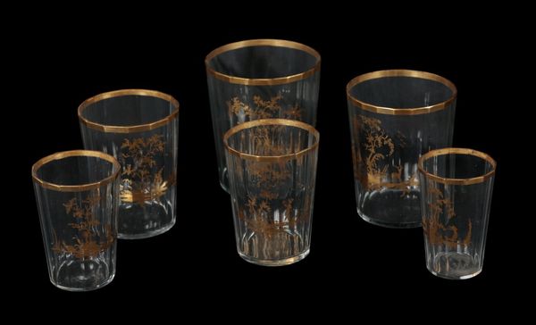 A GRADUATED SET OF SIX EARLY 19TH CENTURY GILDED GLASS TUMBLERS