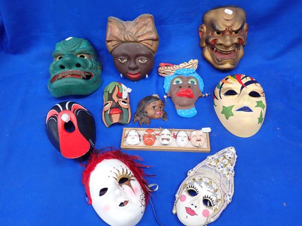 A COLLECTION OF DECORATIVE MASKS