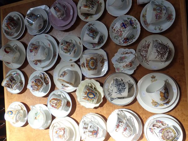 A COLLECTION OF ROYAL COMMEMORATIVE CUPS AND SAUCERS