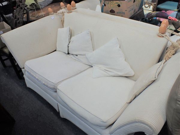 A  PAIR OF LAURA ASHLEY WHITE KNOLE SOFAS