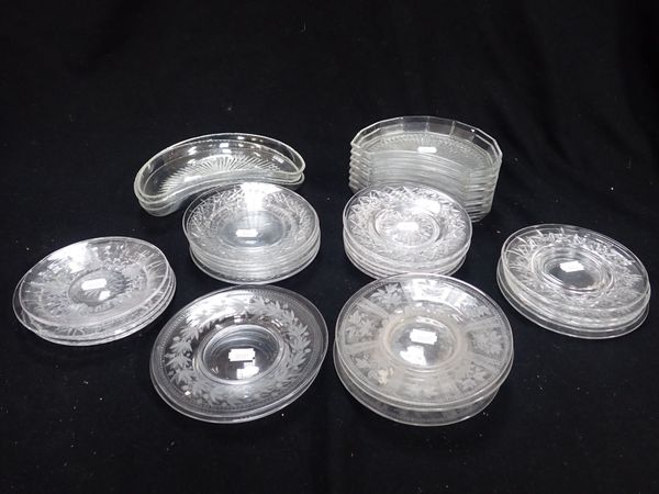 A COLLECTION OF GLASS PLATES AND SERVING DISHES