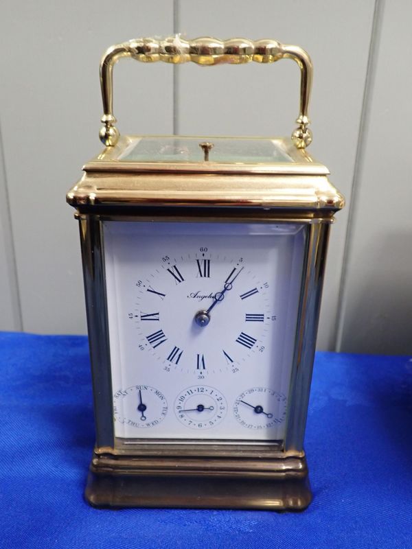 A FRENCH REPEATING CARRIAGE CLOCK, WITH CALENDAR AND ALARM DIALS