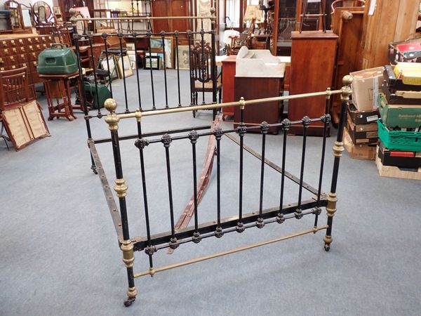 A VICTORIAN BRASS AND IRON DOUBLE BEDSTEAD