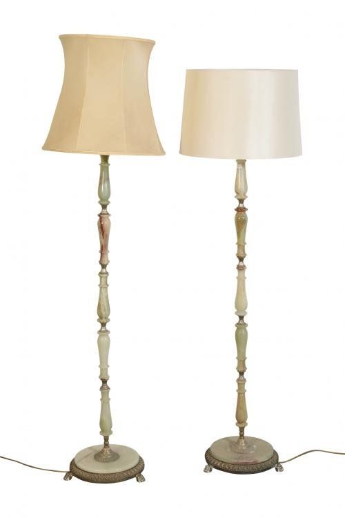 A NEAR PAIR OF ONYX STANDARD LAMPS