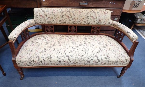 AN EDWARDIAN TWO-SEAT SETTEE