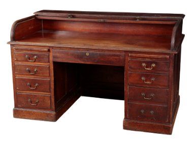 A 1920S MAHOGANY ROLL TOP DESK