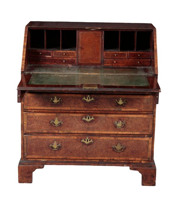 A GEORGE III WALNUT, CROSS BANDED AND BRASS STRUNG BUREAU