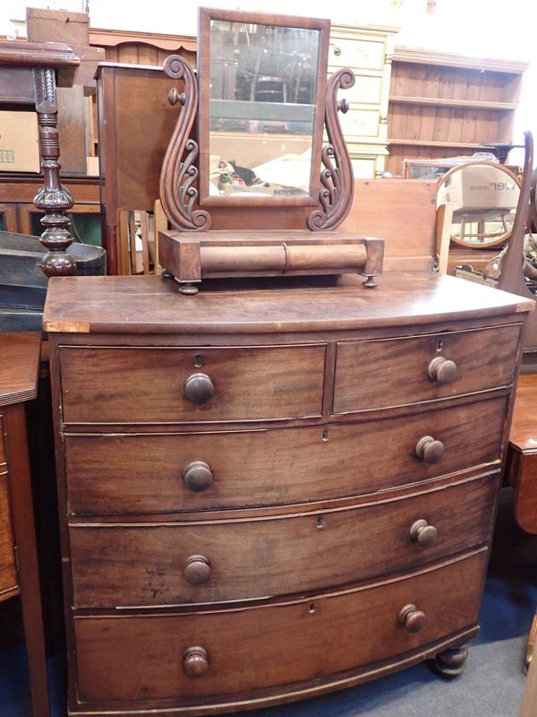 A BOW FRONTED VICTORIAN CHEST OF DRAWERS