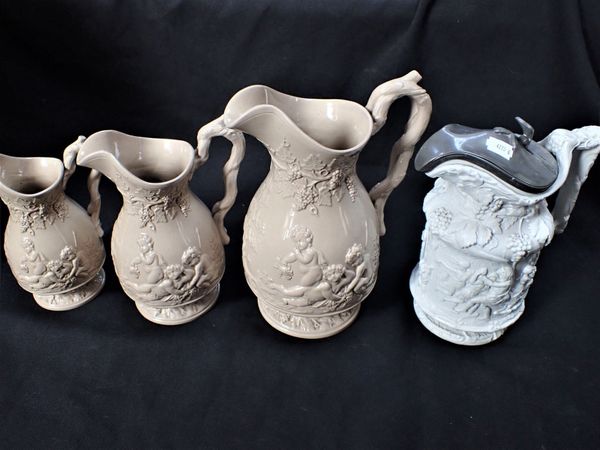A SET OF THREE VICTORIAN MOULDED JUGS