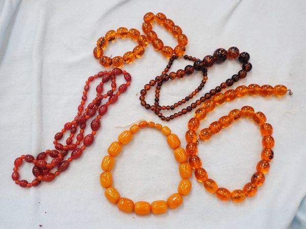 A COLLECTION OF 'AMBER' STYLE BEADS