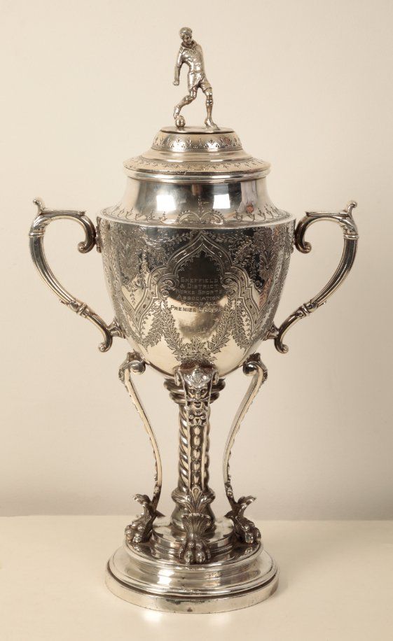 A LARGE AND IMPRESSIVE SILVER PLATED TROPHY