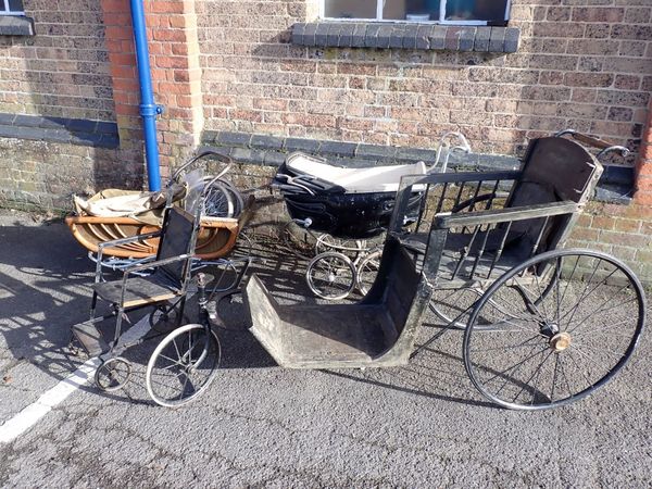 A VICTORIAN INVALID  CARRIAGE CHAIR