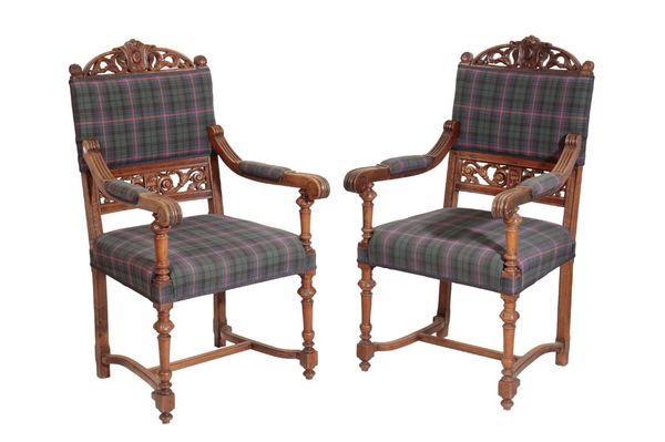 A PAIR OF CARVED WALNUT AND UPHOLSTERED ELBOW CHAIRS IN FRENCH 17TH CENTURY STYLE,