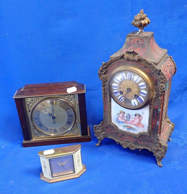 AN 18th CENTURY STYLE BOULLE CASED CLOCK, WITH PORCELAIN PANEL