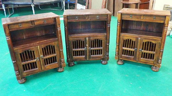 A GROUP OF THREE STAINED WOOD SIDE CABINETS