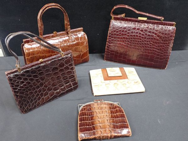 A COLLECTION OF CROCODILE HANDBAGS