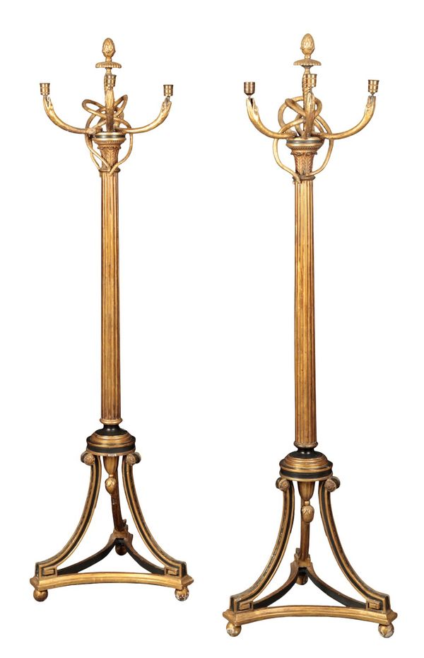 A PAIR OF REGENCY BLACK AND GILT-JAPANNED TORCHERES
