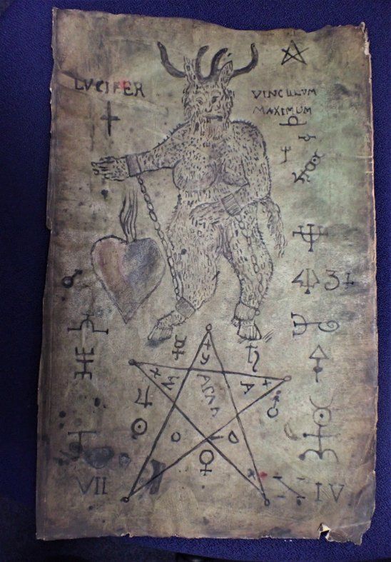 A 'GRIMOIRE' IMAGE OF LUCIFER IN CHAINS