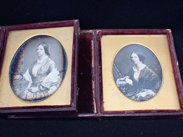 TWO DAGUERREOTYPE PHOTOGRAPHS, OF THE SAME YOUNG WOMAN