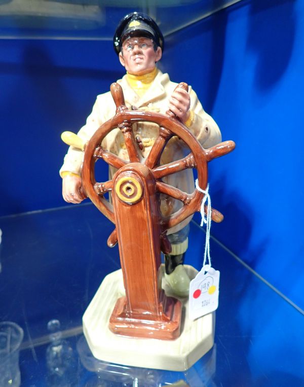 A ROYAL DOULTON FIGURE